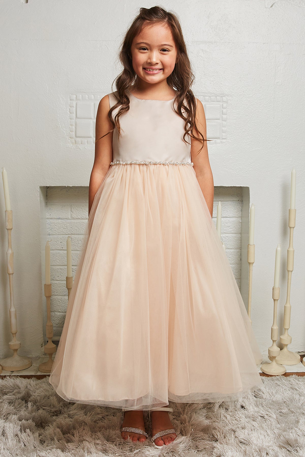 Girls' Special occasion buying white/ivory dress with pearl trim on the waistline. Size